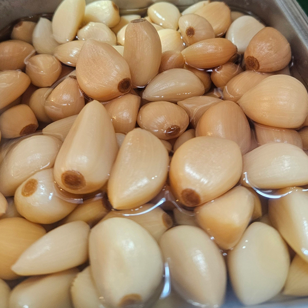 [강북구·도봉구 배달] 짭쪼름한 깐마늘 장아찌 400g [수유전통 원조수유김] : 동네시장 장보기